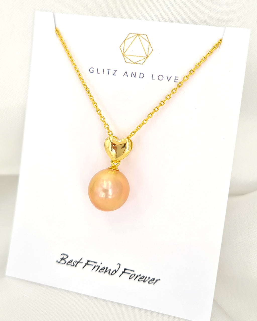 Pearl Necklace | Metallic gold peach freshwater pearl pendant necklace with gold heart | handmade in Singapore